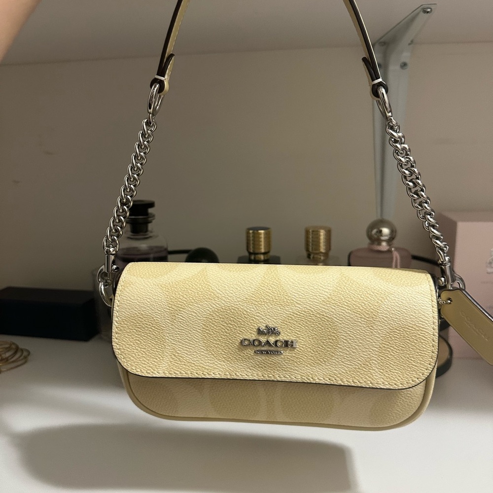 Coach pastel yellow flap bag